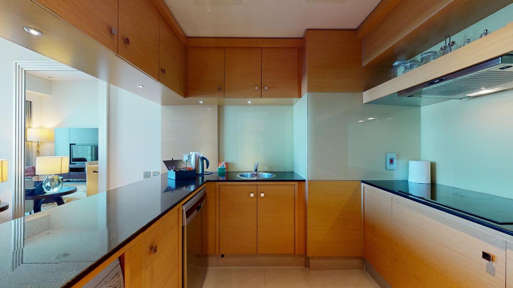 Marriott Executive Apartments Al Jaddaf, Dubaj Pokoj fotografie A kitchen in a hotel suite